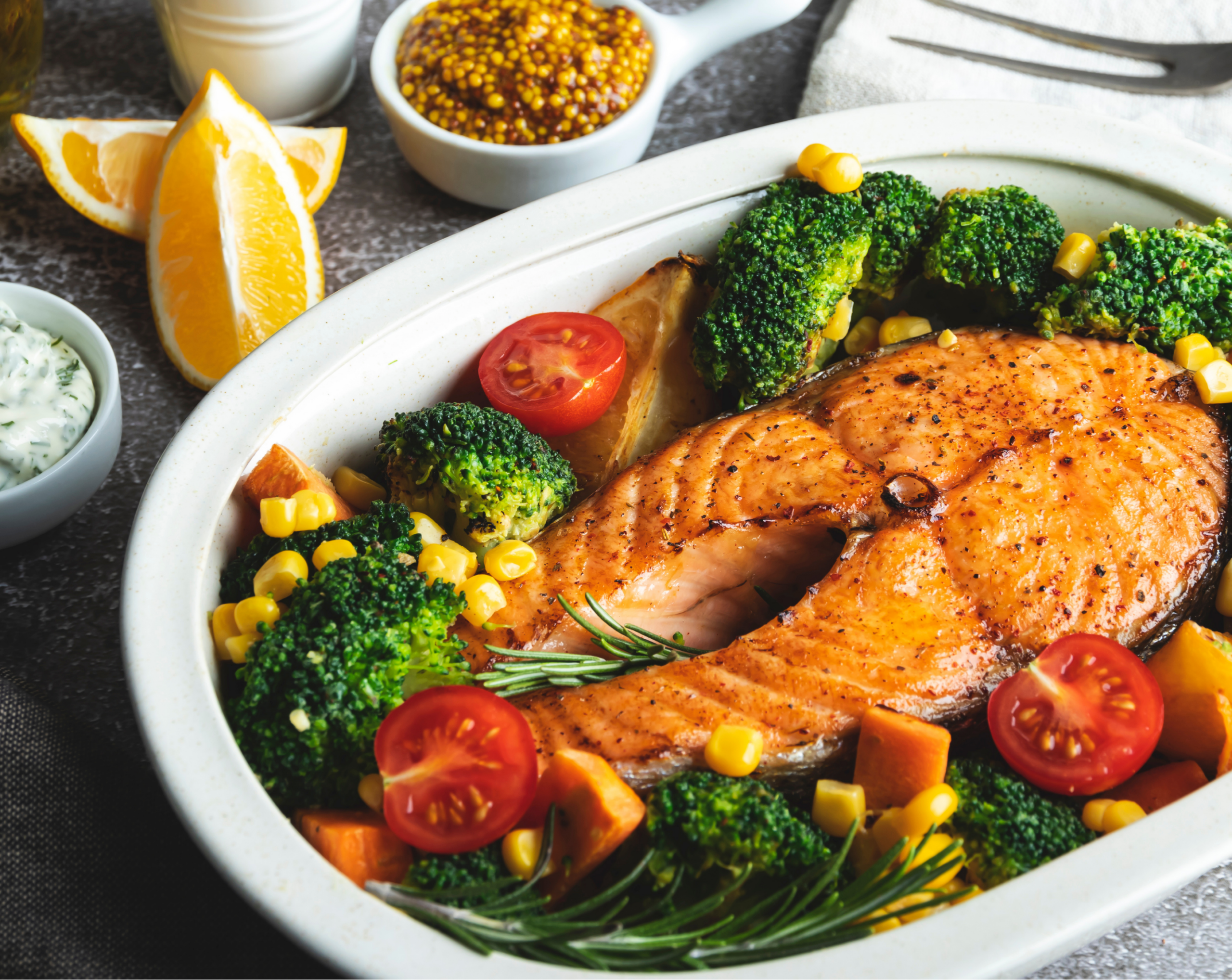 Healthy balanced meal with salmon and vegetables that helps you feel full and supports weight loss in Omaha